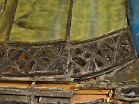 Detail at jeweled glass at Kings robes hem
